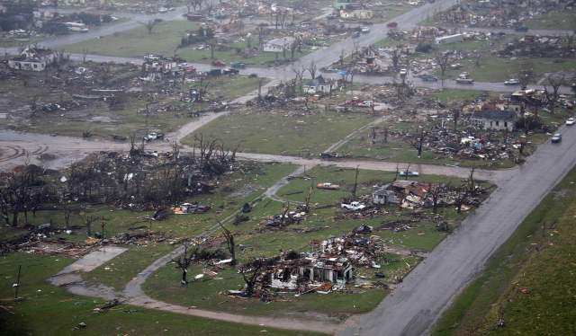 Debris from destroyed homes is scattered throughout Greensburg, Kansas Greensburg