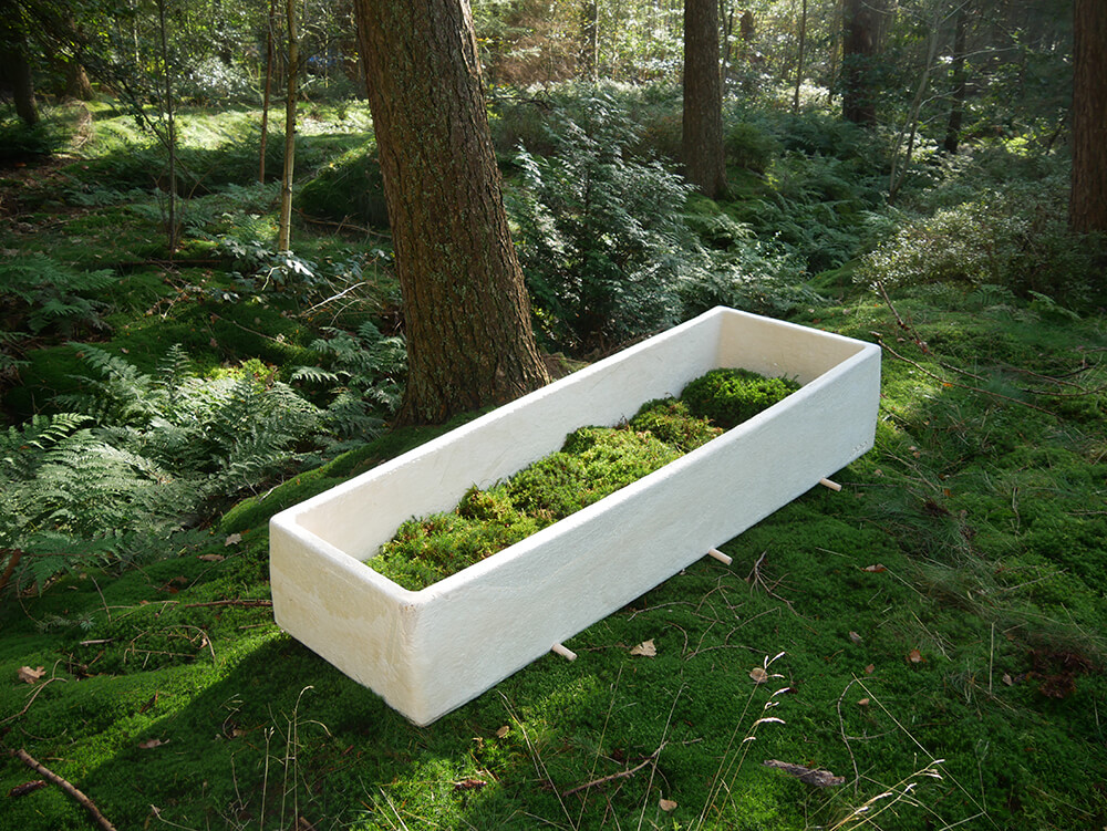 Mushroom coffin for less toxic burials