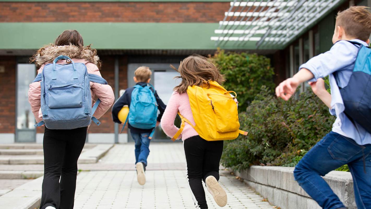 Kids running back to school with Eco Friendly Backpacks