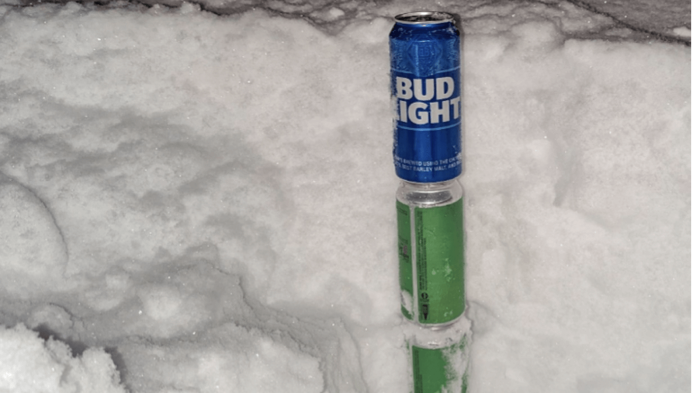 Tall boys blizzard; three 16-ounce cans of beer stacked top to bottom against the fresh snowfall