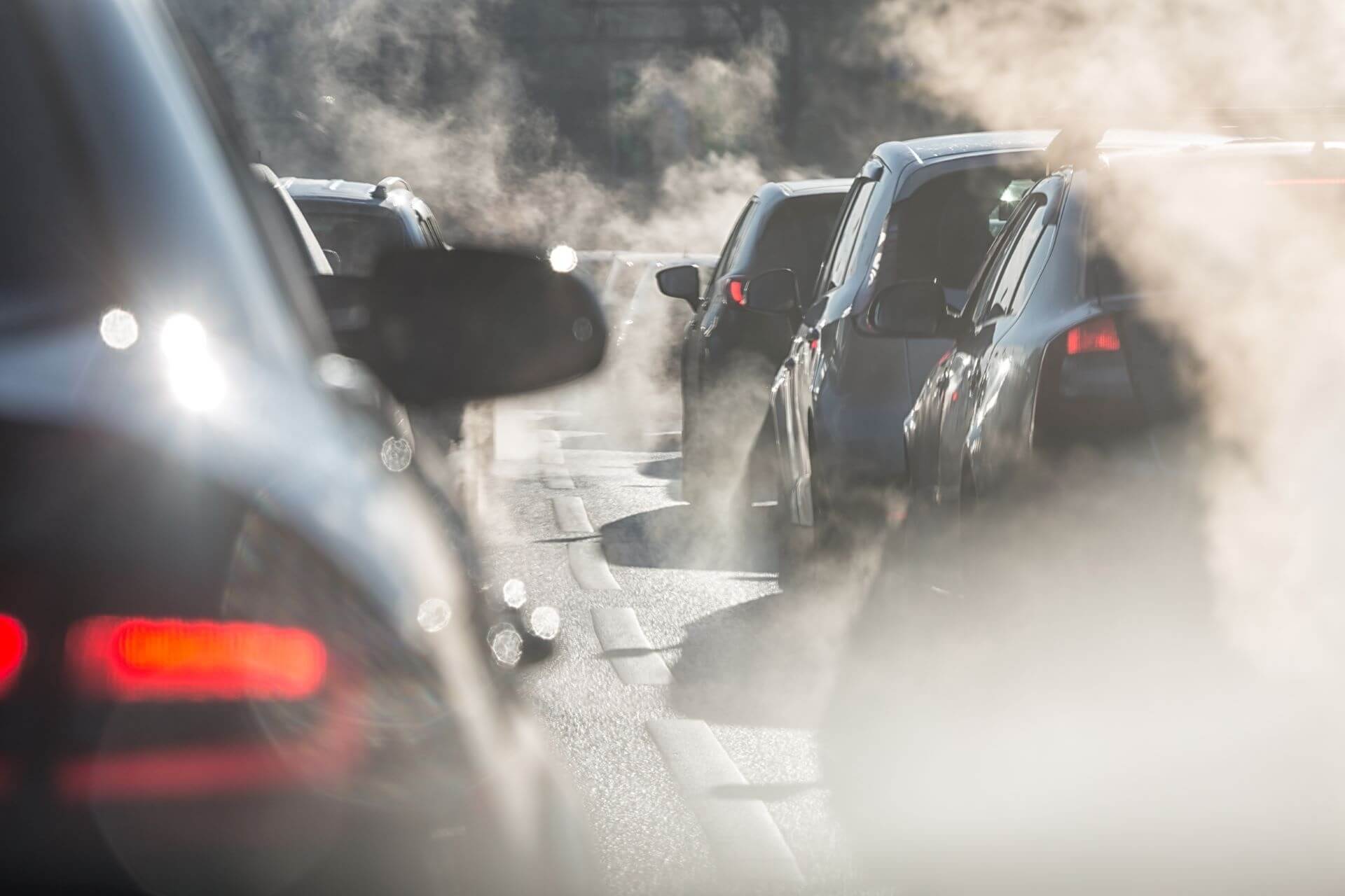 car releasing harmful exhaust fumes