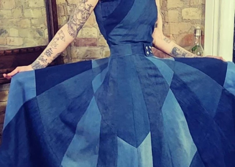 Seamstress creates a denim dress by upcycling old jeans