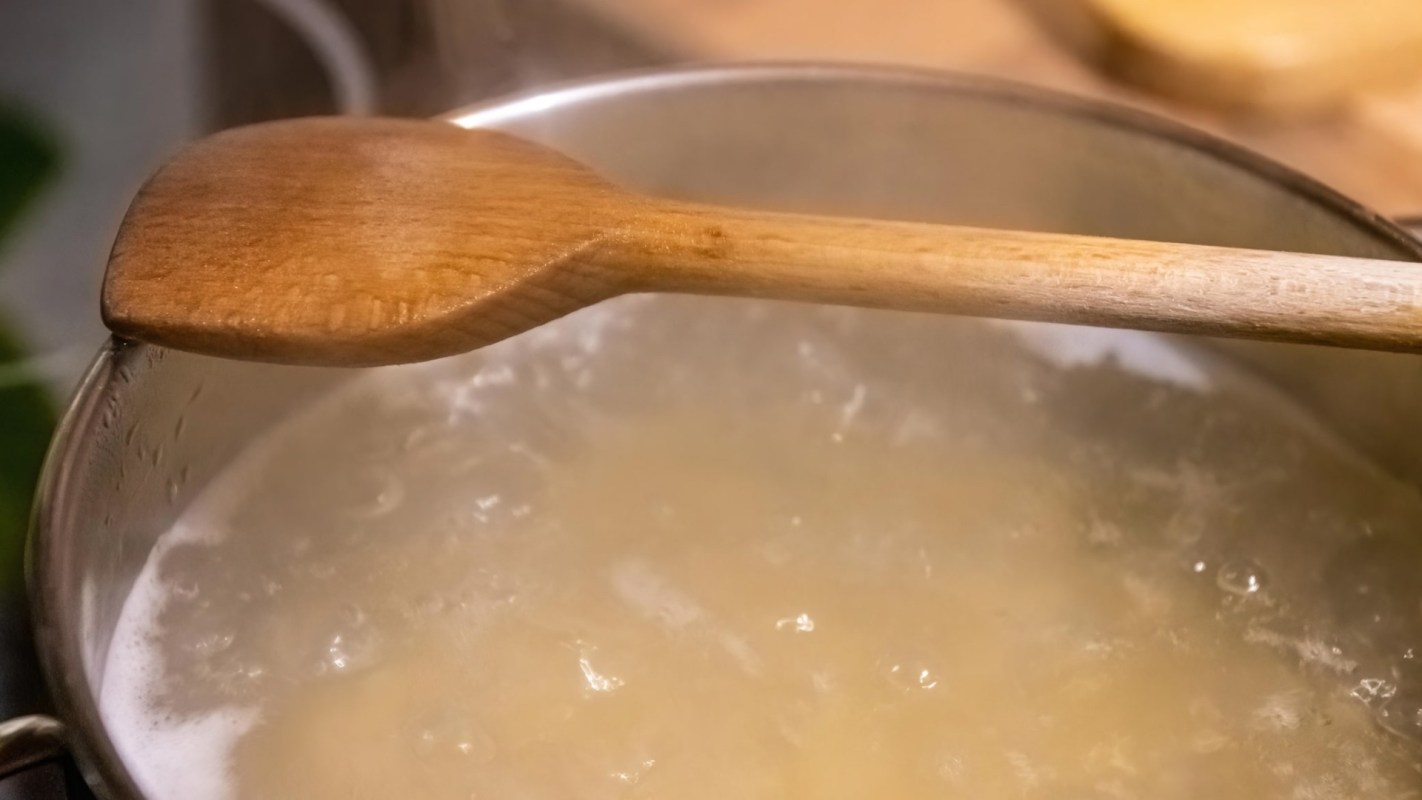 Wood spoons being cleaned