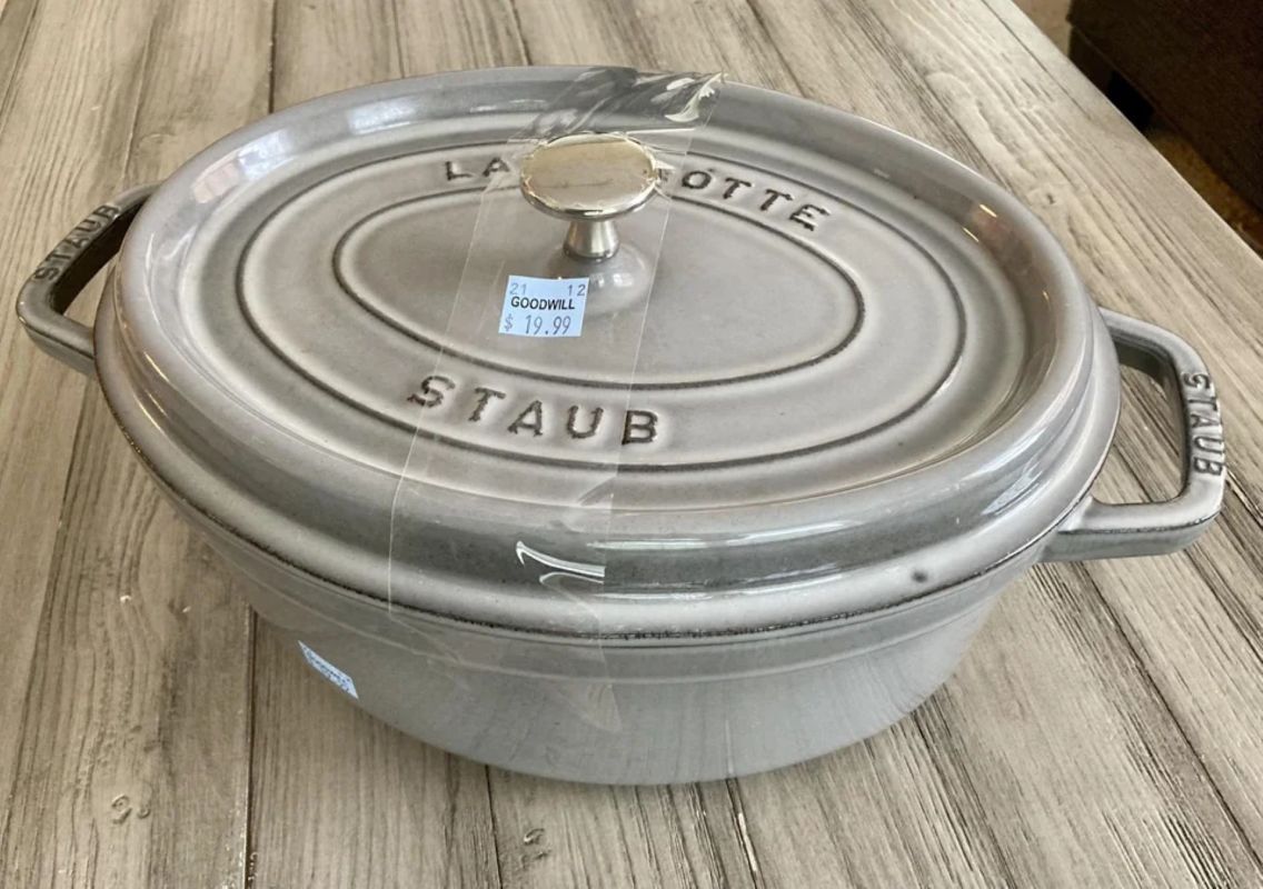 The pot appears to be Staub's 7-quart oval Dutch oven, which currently retails for $420.