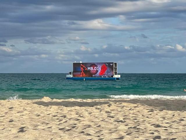 Billboard popping up off a coast