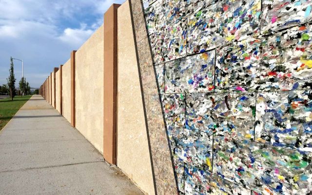A wall that is partially made of plastic bricks.