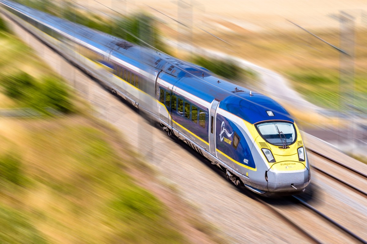 Baron, France - July 29, 2020: A Eurostar e320 high speed train is driving at full speed in the french countryside (artist's impression).