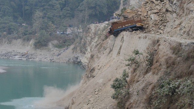 Debris from the landslides, along with heavy flooding, also caused many cars to be trapped.