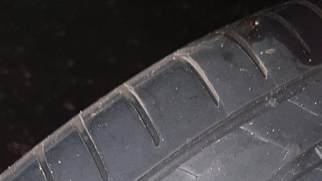 "Just had to change a flat, any idea what could've caused this damage to the tire?"