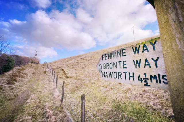 It includes moorlands, country parks, and wetlands.