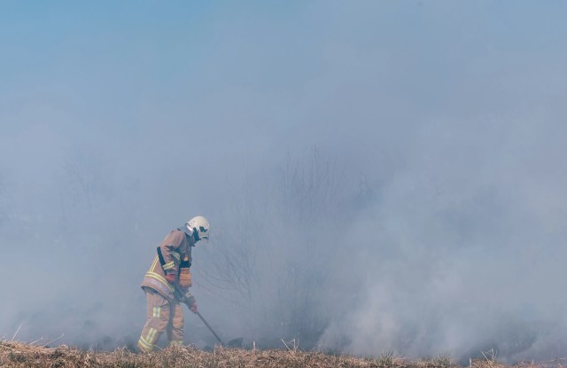 The fires had resulted in the deaths of at least one firefighter and two others.