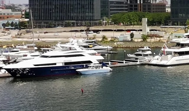 "Which impoverished loser owns the yacht on the left?"