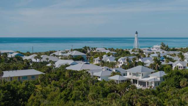 There are "only a few dozen properties on a private, man-made island where a vacant lot recently sold for $110 million."