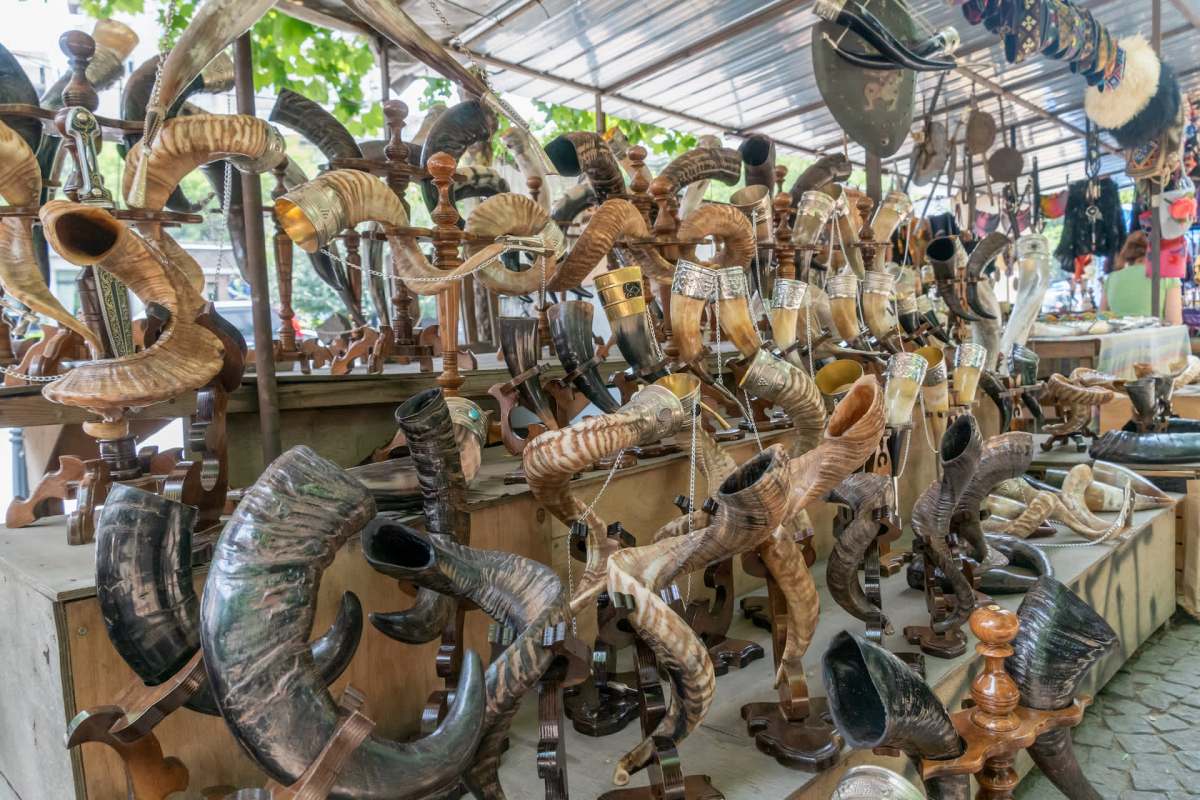 Guides usher visitors inside, and staff launch into polished sales stories.