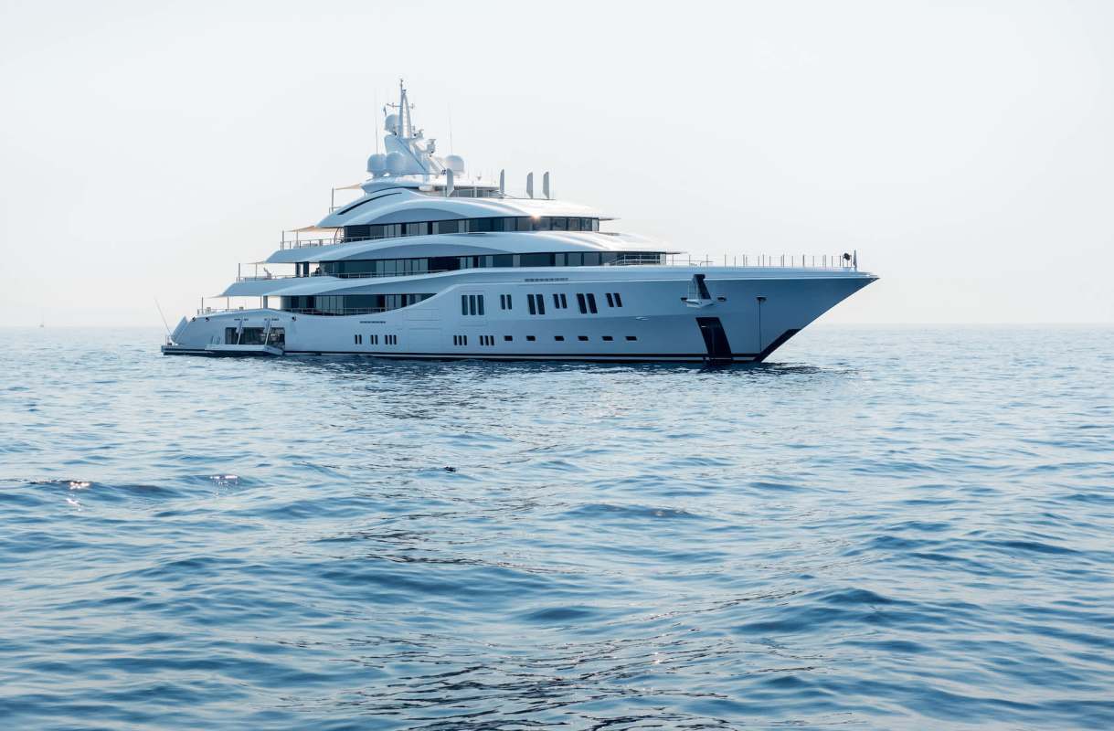 The yacht includes a gym, four decks, a built-in pizza oven, an elevator, and a 10-meter pool.