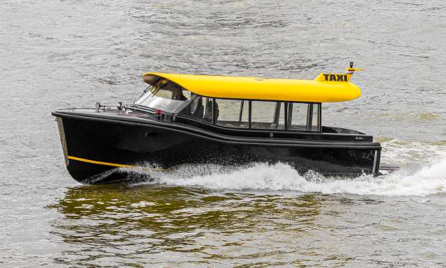 The collaborators studied the old boats to create a modernized version.