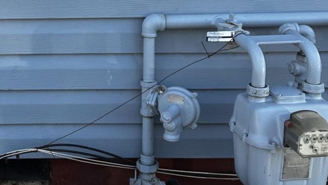 A New England homeowner's off-grid setup sparked outrage when they shared a photo of a propane generator in their shed.