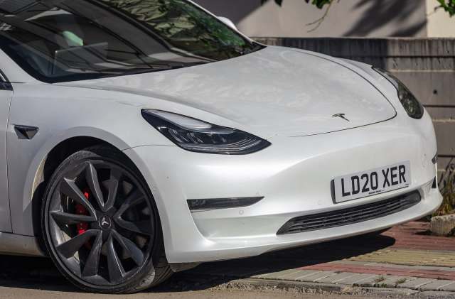 The Tesla Model 3 owner was shamed by a neighbor for sharing a video of the vandalism on Reddit.