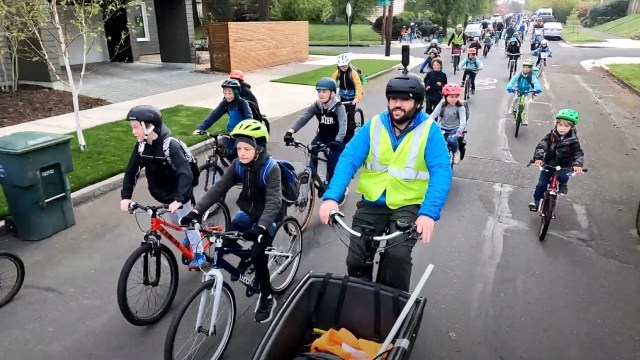 Former teacher Sam "Coach" Balto's revolutionary bike bus idea has made biking to school trendy.