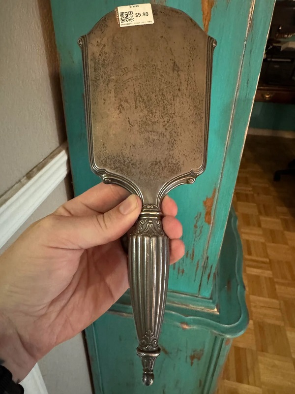 One high-flying thrifter shared how discovering a $10 mirror at a thrift store led to a spookily cryptic revelation.