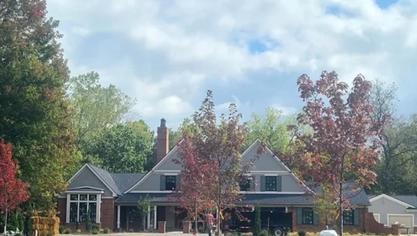 One Redditor shared a photo of a newly built house and front yard, leading to a discussion about proper landscaping.