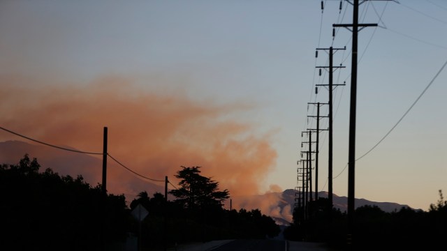Millions are under heat advisories as soaring temperatures and gusty winds create critical fire weather in Southern California.