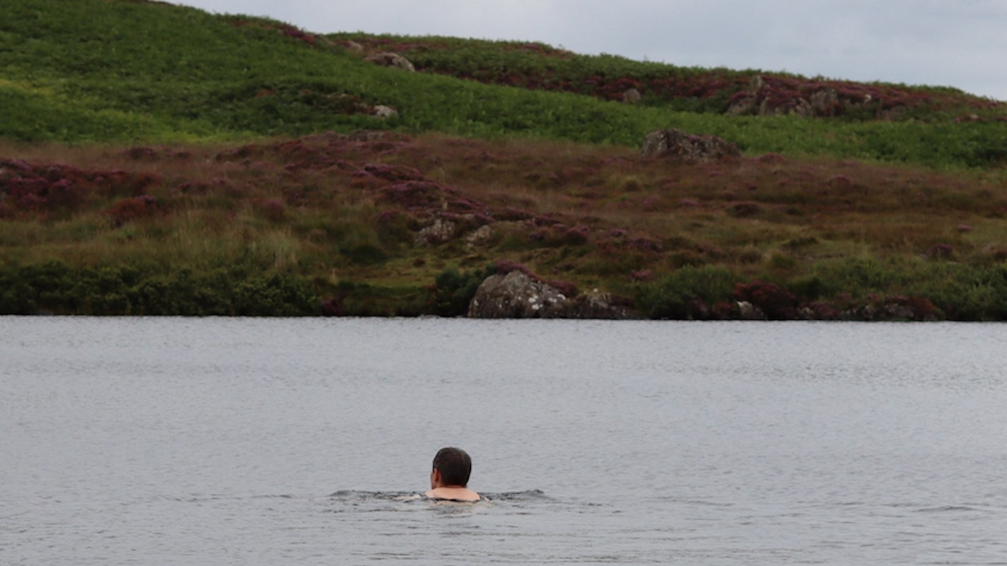 One Michigan resident is catching invasive rusty crawfish by hand and turning them into a delicious lake-to-table meal.