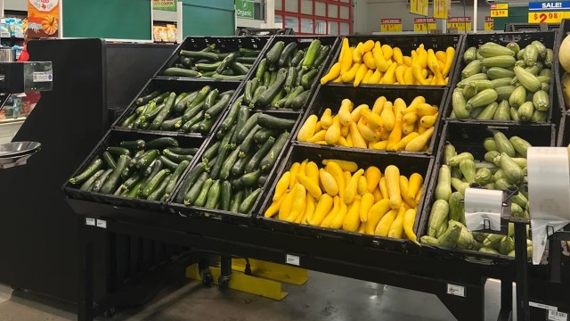 A shopper at a Texas-based supermarket chain wondered, "What is going on here?" after coming across a display of organic produce with unwelcome additions.