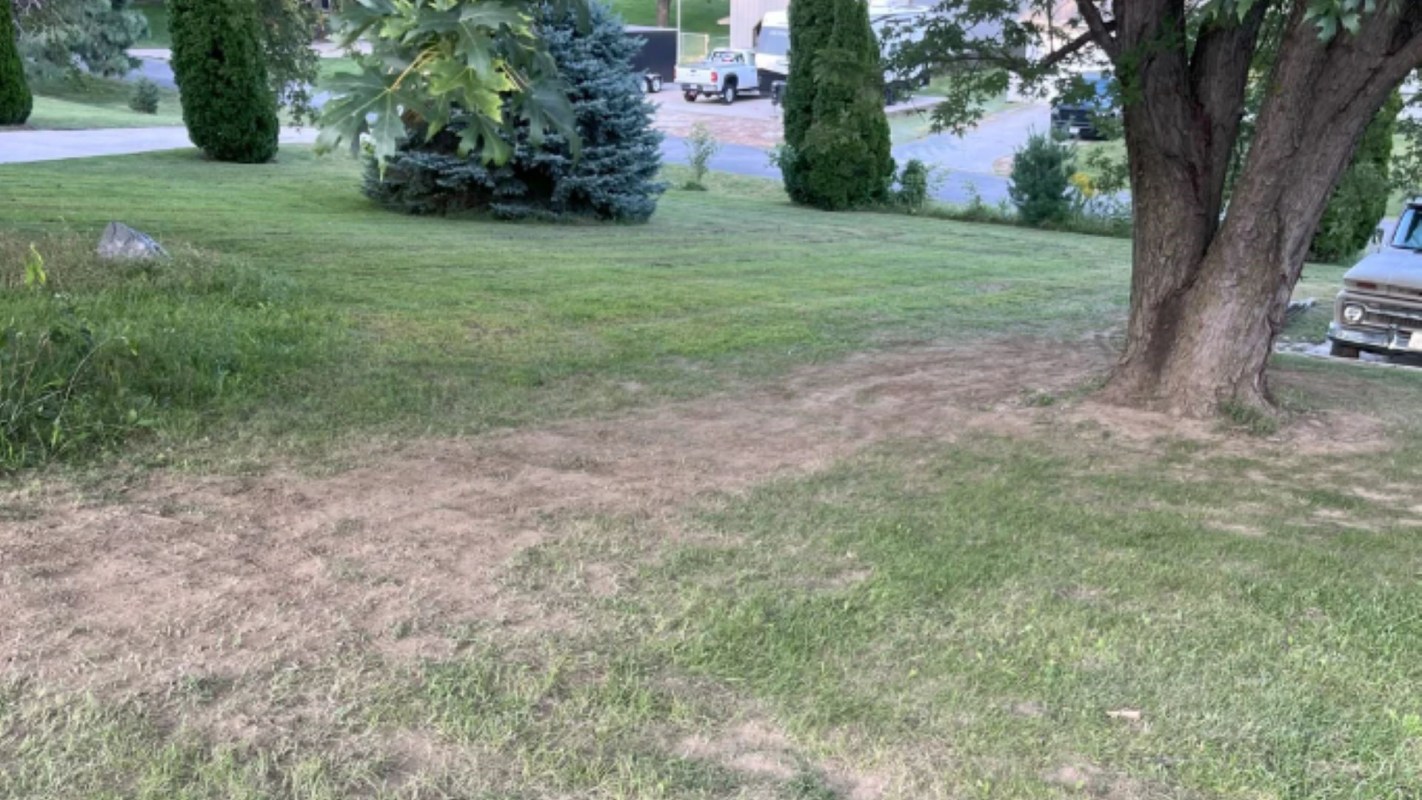 One Reddit user shared how their neighbor was dumping clay and silt all over their property.