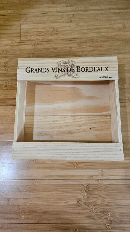 One clever Reddit user repurposed upcycled wooden wine boxes into shelves for his/her houseplants.