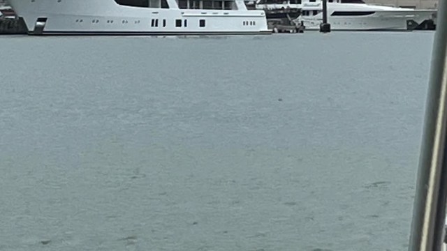 A pedestrian spotted a billionaire's two superyachts docked near the billionaire’s waterfront properties.