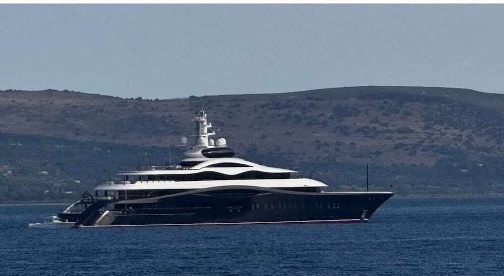 One Redditor shared photos of a massive navy and white superyacht and questioned, "What is this yacht called? Whose is it?"