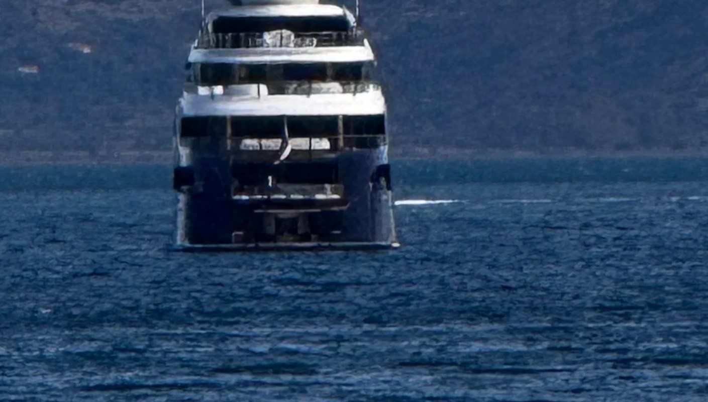 One Redditor shared photos of a massive navy and white superyacht and questioned, "What is this yacht called? Whose is it?"