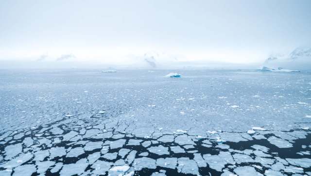 Researchers studying the climate record in Antarctica's ice were surprised to discover trace amounts of sediment in the ice layers.
