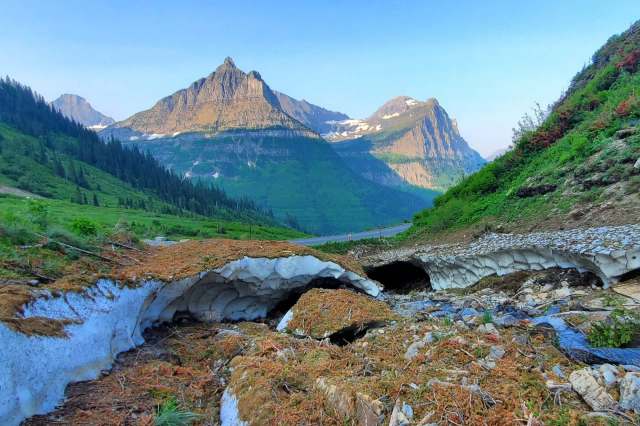One Reddit user took to the Glacier National Park subreddit to share photos of tourists endangering themselves on a perilous snow bridge.