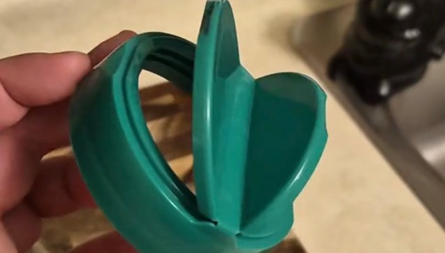 A TikTok video shows the simple way to repurpose your parmesan cheese container's lid.