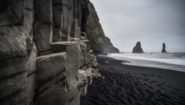 A video shows several people narrowly escaping a monstrous wave at Iceland's Reynisfjara black sand beach.