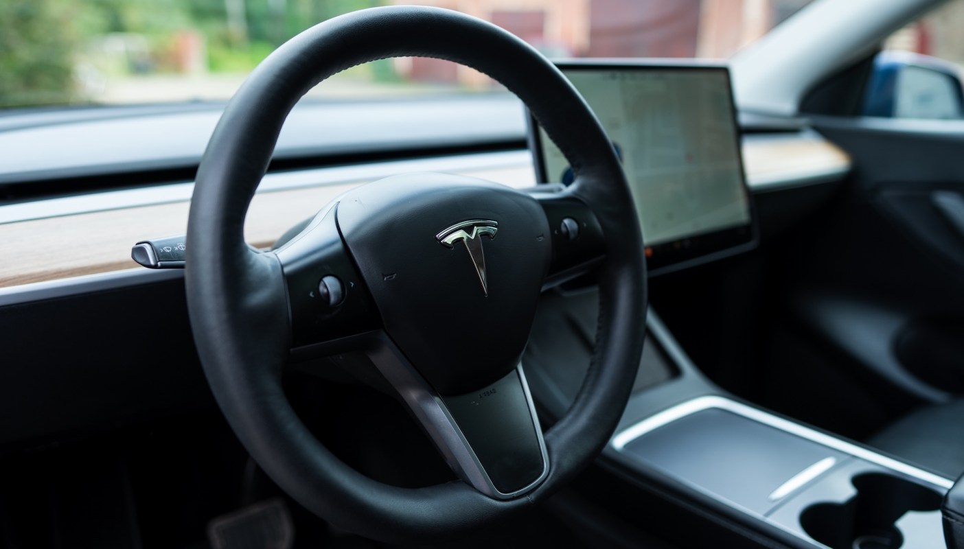 A Tesla driver using Autopilot was arrested after crashing into a police vehicle while allegedly asleep at the wheel.