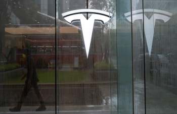 Tesla is making another run at India's electric vehicle market, this time with an unlikely veteran of the country's luxury auto scene.