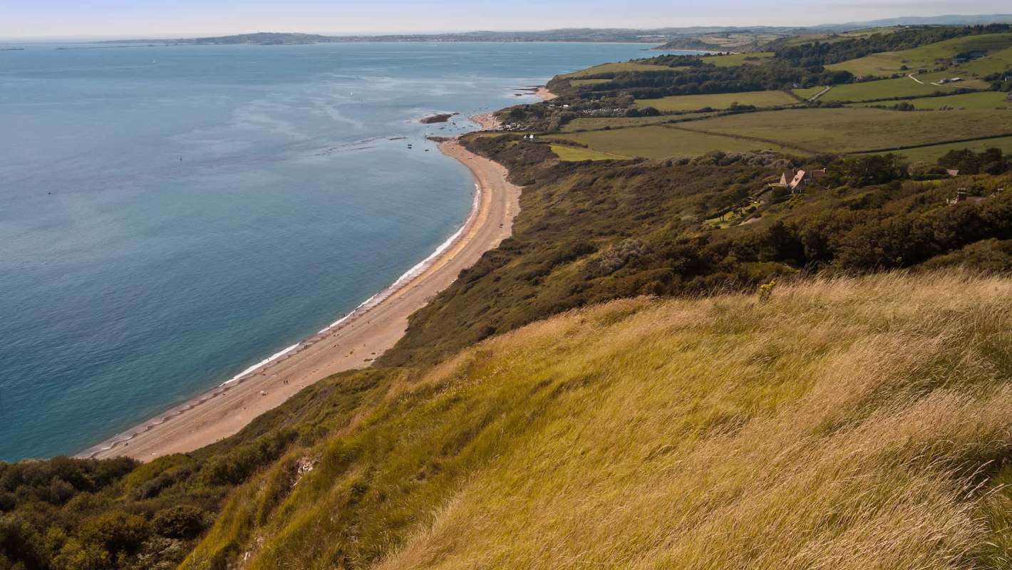 A proposed new coastal development in Dorset, England, is facing backlash for its potential to alter a fragile landscape.