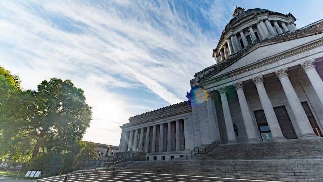 The state of Washington has halted a rebate program that refunded millions to farmers and truckers in accordance with an agricultural exception to pollution-related fuel fees.