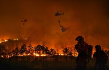 California firefighters are battling a wildfire that spread rapidly this week.