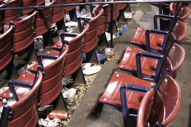 Redditors were outraged when a stadium worker posted a photo of perfectly good, wasted pizza, raising issues of food waste and hunger.