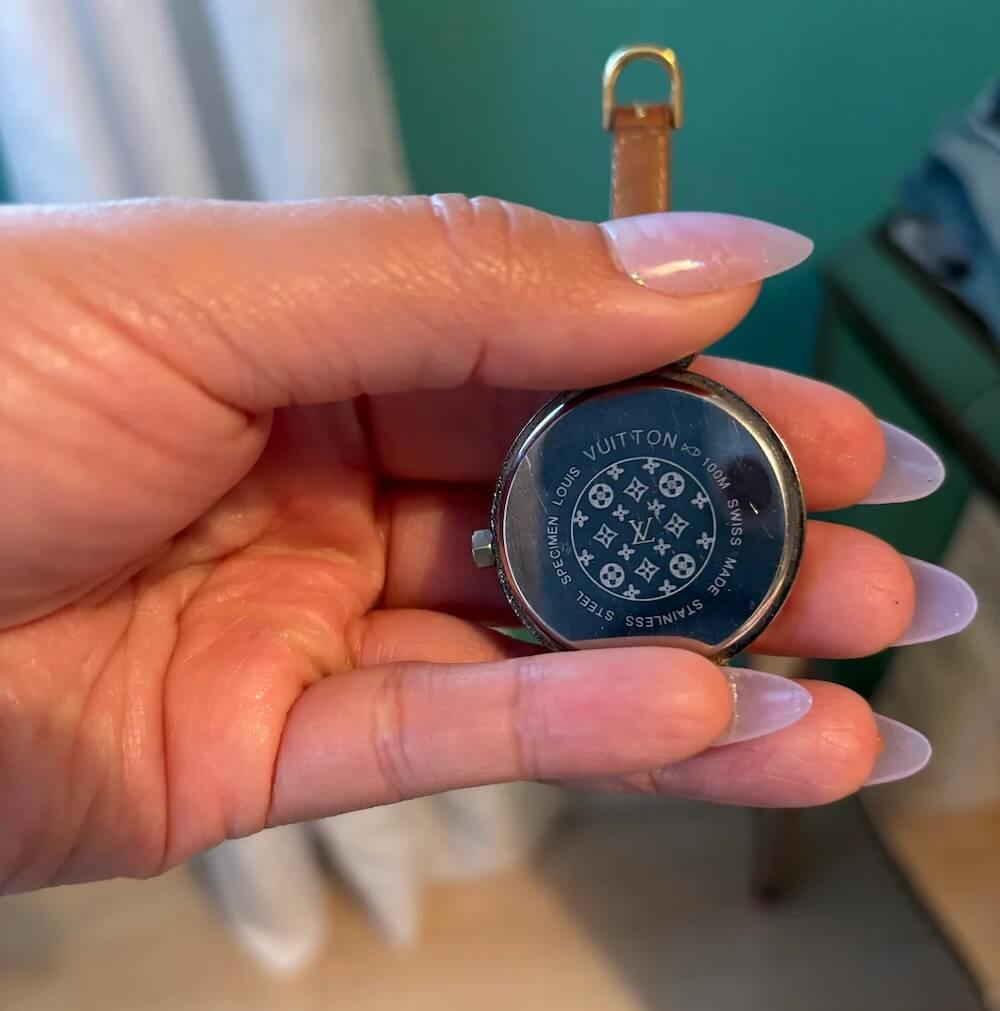 A Redditor shared their thrift store haul, which included a $10 Louis Vuitton watch found in a secondhand bin.