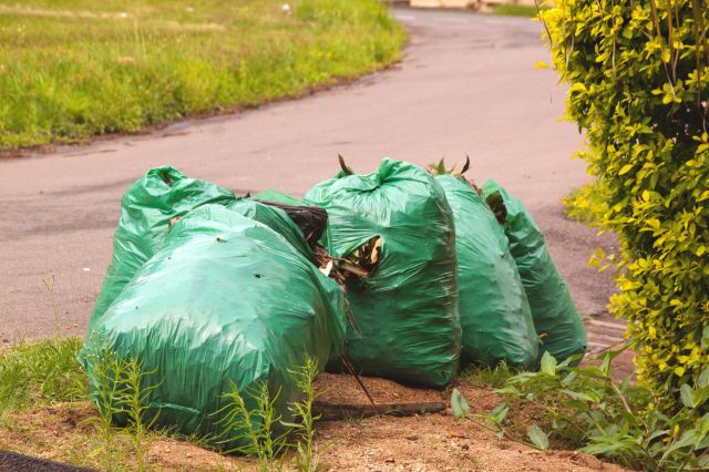 A woman in the U.K. has been hit with massive fines for illegally fly-tipping trash.