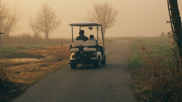 A viral video shows a bull elk on a golf course in Estes Park, Colorado, chasing after a speeding golf cart.