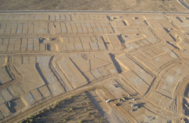Wealthy buyers are shelling out millions for empty dirt lots in The Summit Club, an exclusive Las Vegas neighborhood.