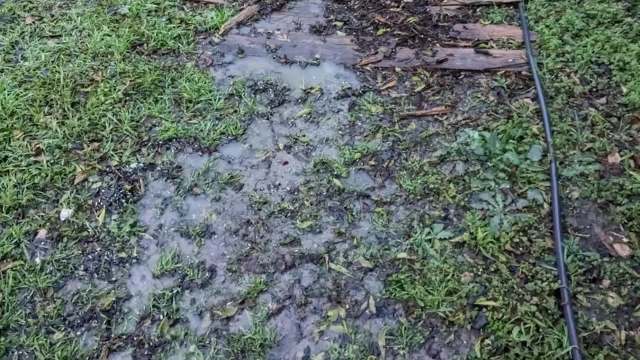 Land sculpting, as showcased in one Redditor's before-and-after photos, is a useful way to help prevent yard flooding.