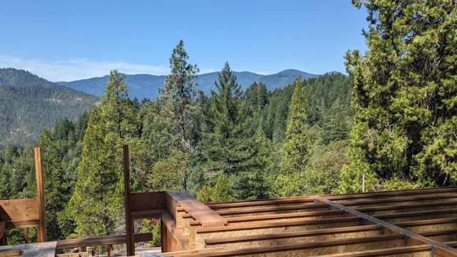 One Redditor shared breathtaking photos and details of their in-progress off-grid mountain home in the lush Coast Range of Oregon.
