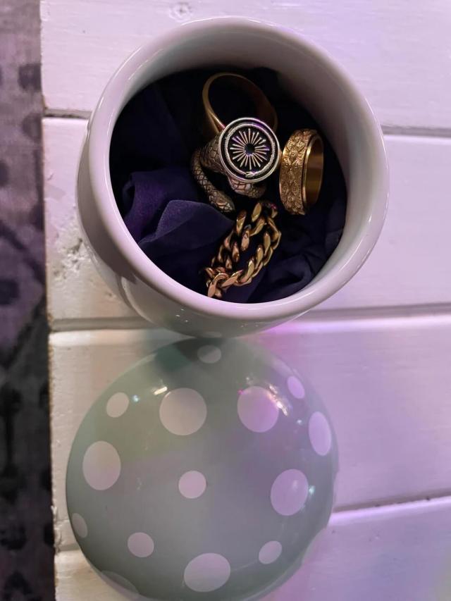 One Reddit user showed how to repurpose a candle jar as a clever way to store and organize one's jewelry.